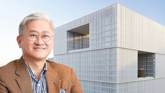 Amorepacific executives in front of the company's new Yongsan headquarters in Seoul